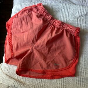 Nike Women's Bright Orange Athletic Shorts